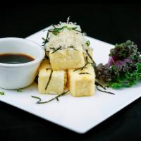 Agedashi Tofu · Flash fried silky tofu with green onions served with tempura sauce.