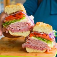 #1. Milano Special Sandwich · Ham, salami, ham capicola, mortadella, provolone, lettuce, tomato, roasted peppers with oil ...