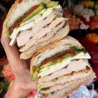 #12.  Classico  Sandwich · Grilled chicken, fresh mozzarella, sun-dried tomato and avocado with pesto.
