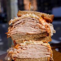 #19. Smoke Show Sandwich · Turkey, smoked Gouda, coleslaw, chipotle aioli on rye.