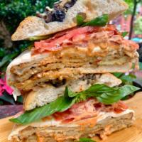 #H6. Mt. Etna Sandwich · Eggplant, spicy soppressata, fresh mozzarella, tomato, fresh basil on focaccia.