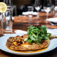 Pork Milanese · Thin pounded, bone-in chop, wild mushrooms, baby watercress, cucumber, pomegranate and elder...