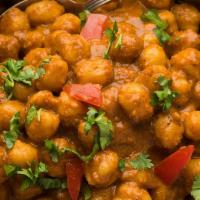 Chana Masala (VEGAN) · Chickpeas stir fried in an authentic masala made up of onions, ginger , turmeric, cumin, fre...