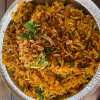 CHICKEN BIRYANI · Supreme long grain Basmati rice stir fried with chunks of boneless chicken thigh onions, spi...