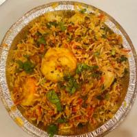 SHRIMP BIRYANI · Supreme long grain Basmati rice stir fried with jumbo shrimp onions, spices & herbs.