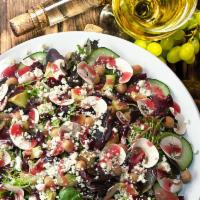 Fresh Veggie Salad · Spring lettuce, cucumber, tomato, chickpeas, white mushrooms, dried cranberries, feta. Recom...