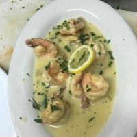 Shrimp Scampi · Sauteed with garlic in butter and olive oil. Served with pasta or salad.