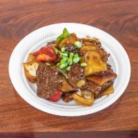 Pepper Steak · Stir-fried sliced tender beef with brown onions, bell pepper, and sliced bamboo shoots in ou...