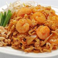 Pad Thai · Classic Thai rice noodle stir-fried with egg, chicken, bean, sprouts, green onion, and groun...
