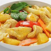 Yellow Curry · Spicy. Yellow curry paste, onion, carrot, potato, and red bell pepper with coconut milk, cho...