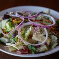 Italian Chopped Salad · A mixture of fresh greens, tomatoes, kalamata olives, banana peppers, and red onion rings to...
