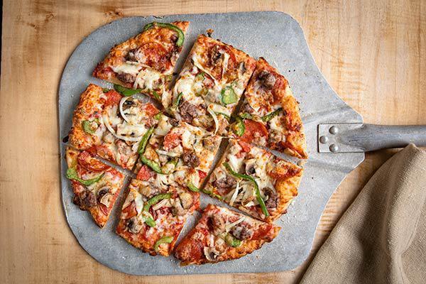 Individual Windy City Works  · 9 Slices. Fresh onions, peppers and mushrooms with bacon, hamburger, pepperoni, crumbled sausage, and our 3-cheese blend. House specialty. 