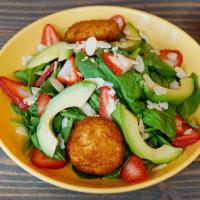 7th Avenue Salad · Baby spinach, sliced strawberries, sliced avocado, fried goat cheese, sliced almonds and a l...