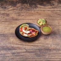 Spanish Chorizo Taco · Avocado sauce and fresh cilantro. Served on authentic homemade nixtimal corn tortillas. Topp...
