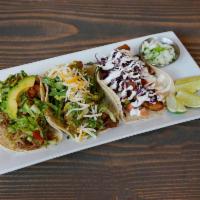 Chili-Lime Chicken Entree Tacos · 3 tacos and a side. Grilled chicken, lettuce, queso, corn tortilla and tomatillo sauce. Serv...