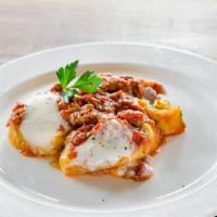 Tray of Gnocchi Roll · Served with bolognese or marinara and bechamel cream.

Please be aware that all catering ord...