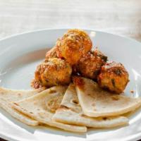 Meatballs with Piadina Flatbread · Not gluten-free. Home-made beef and pork meatballs served with flatbread.