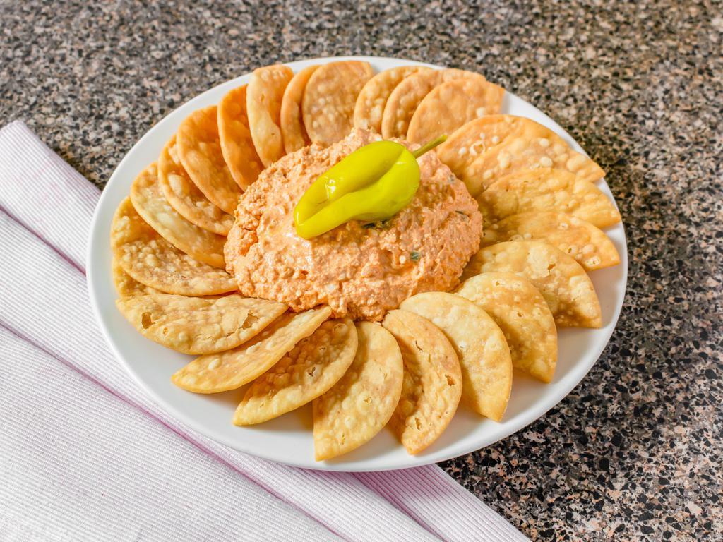 Pita Chips and Spicy Feta Dip · Round unleavened flatbread. 