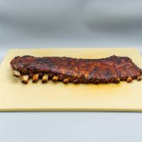 RIB - Full Rack  · A full rack is 12 bones. Our ribs are rubbed and marinated with southern spices, then smoked...