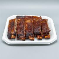 RIBS - Half Rack · A half rack is 6 meaty bones. Our ribs are rubbed and marinated with southern spices, then s...