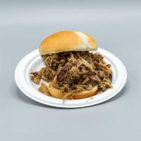 Pull Pork Sandwich · Sandwich made from shredded slow cooked meat.