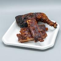 Ribs and Chicken Combo · Three tender ribs rubbed with southern spices, then smoked to perfection with deliciously fl...