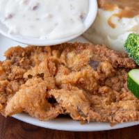 Chicken Fried Steak · Ribeye steak breaded  and fried, topped with country gravy. Served with your choice of 2 sid...