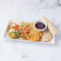 Chile Relleno · Beer battered roasted poblano pepper stuffed with Oaxaca cheese topped with poblano queso sa...