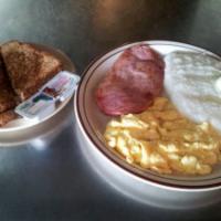 Ham Steak and Eggs Breakfast · Served with choice side and bread item.
