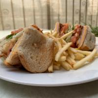 Club Sandwich · Served with turkey, bacon, lettuce, tomato, American cheese and mayo. Comes with choice of b...