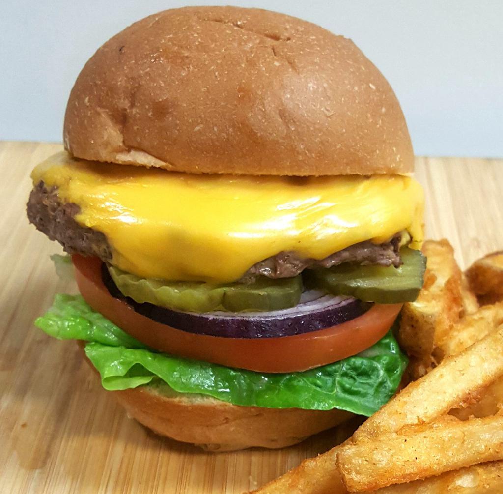 Cheeseburger and Fries · 1/3 lb. angus beef patty, American cheese, lettuce, tomatoes, onions, pickles and creamy spread sauce on a brioche bun.