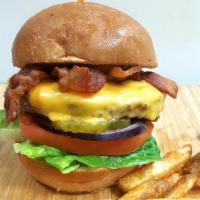 Bacon Cheeseburger & Fries · 1/3 lb. angus beef patty, American cheese, thick crispy bacon, lettuce, tomatoes, onions, pi...