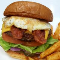 Sunrise Burger & Fries · 1/3 lb. angus beef patty, American cheese, fried eggs, lettuce, tomatoes, onions, pickles an...