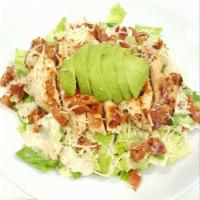 Bacon Avocado Chicken Caesar · Grilled chicken, crispy bacon, sliced avocado, romaine lettuce, and parmesan cheese with sid...