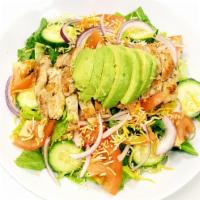 California Chicken Salad · Grilled chicken, avocado, romaine lettuce, cucumbers, tomatoes, onions, cheddar cheese, and ...