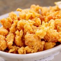 Fried Crawfish Tails · Served with cocktail sauce.