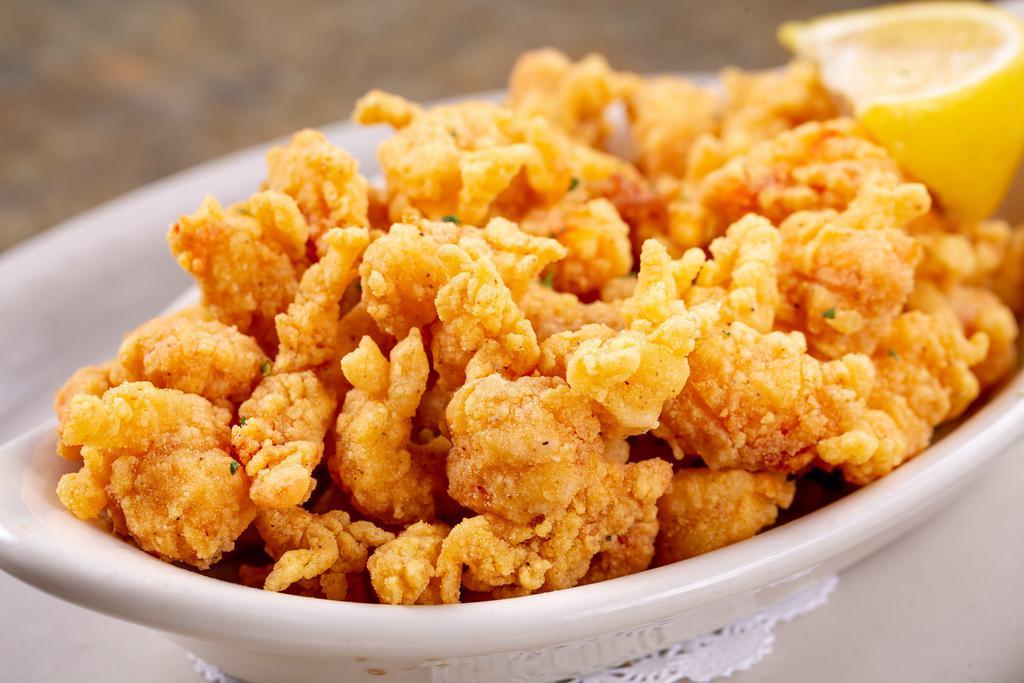 Fried Crawfish Tails · Served with cocktail sauce.