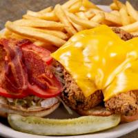 Chicken Club Sandwich · Fried 8oz. chicken breast, bacon, American cheese, lettuce, tomato and mayonnaise served on ...