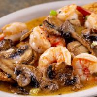 Catfish Cindy · Fried catfish filet topped with sauteed shrimp and mushrooms.