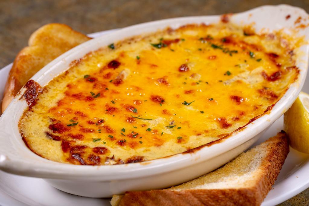Crabmeat au Gratin · Served with your choice of side and a salad.