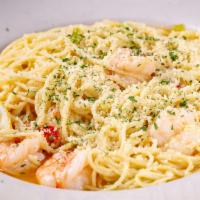 Shrimp Maria · (10) Jumbo shrimp sautéed in a lemon butter wine sauce served over pasta. Served with a side...
