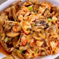 Softshell Patrick · Fried soft-shell crab topped with sautéed crawfish tails and mushrooms in a lemon butter win...
