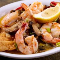 Snapper Devereaux · Fried snapper topped with sautéed shrimp and mushrooms in a lemon butter wine sauce. Served ...