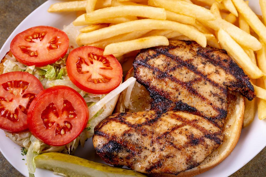 Lunch Grilled Chicken Sandwich Basket · 8 oz. Grilled chicken topped with lettuce, tomato, and mayonnaise on a bun. Served with a side of fries.