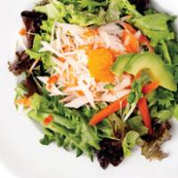 Krab Salad · Crab, cucumber and daikon on top of an arcadian mix with sesame dressing.
