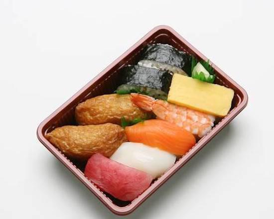 Moriawase Nigiri · 9 pieces. Made with ahi nigiri, ika nigiri, ebi nigiri, salmon nigiri, egg nigiri, futomaki 2 pieces and inari, and shrimp.