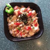 Spicy Ahi Don Deluxe · Ahi cubes, green onion, habanero tobiko, over 1/2 lb. of sushi rice, and spicy sauce.