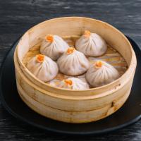 A2. Long King Steamed Soup Dumpling with Crab Meat · 6 pieces.