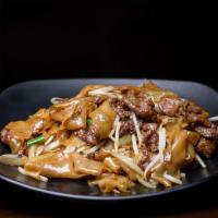 N12. Ho Fun with Beef · Stir fried rice noodle dish.
