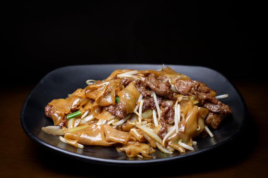 N12. Ho Fun with Beef · Stir fried rice noodle dish.
